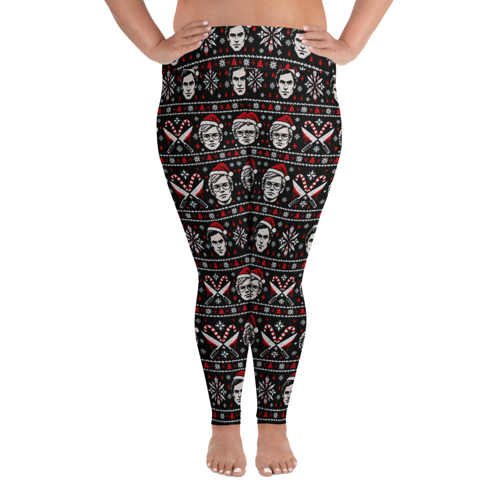 Slay Bells plus size serial killer horror Christmas leggings featuring sinister portrait motifs, crossed knives, candy canes and red faux-knit holiday details.