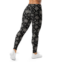 Dead of Winter gothic Christmas leggings featuring black and ivory faux-knit snowflakes in a dark winter holiday pattern.