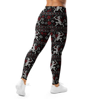 Krampusnacht horror Christmas leggings featuring white Krampus figures, red snowflakes and a black faux-knit holiday pattern.