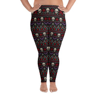 Merry Skull-Mas plus size horror Christmas leggings featuring faux-knit skulls, bats, snowflakes and festive red, purple and white patterns on black.