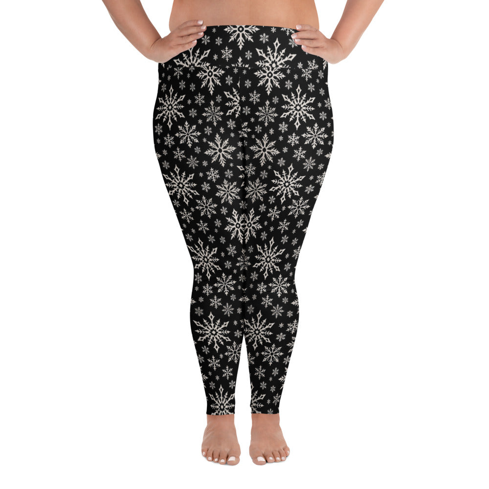 Dead of Winter plus size gothic Christmas leggings featuring black and ivory faux-knit snowflakes in a dark winter holiday pattern.
