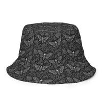 Soul’s Messenger White reversible bucket hat featuring death moth horror artwork on one side and a black My Evil Things branded reverse side.