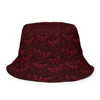 Soul’s Messenger Red reversible bucket hat featuring death moth horror artwork on one side and a black My Evil Things branded reverse side.