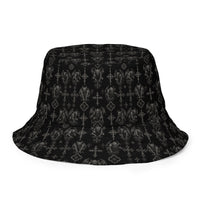 Wardens of Stone reversible bucket hat featuring gothic gargoyle horror artwork on one side and a black My Evil Things branded reverse side.