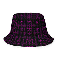 The Sixth Circle Pink reversible bucket hat featuring infernal demon artwork on one side and a black My Evil Things branded reverse side.