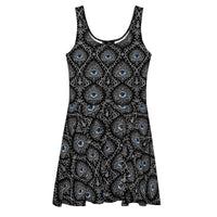 Second Sight psychic eye skater dress featuring electric-blue eyes, black-and-white mystical ornamentation and an all-over occult-inspired pattern.