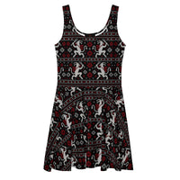 Krampusnacht horror Christmas skater dress featuring white Krampus figures, red snowflakes and a black faux-knit ugly sweater-inspired pattern.