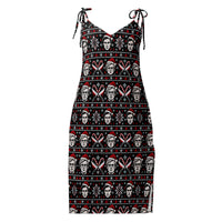 Slay Bells serial killer horror Christmas slip dress featuring sinister portrait motifs, crossed knives, candy canes and red faux-knit holiday details.
