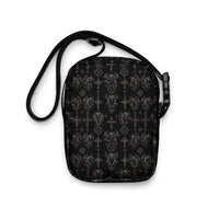 Wardens of Stone utility crossbody bag featuring gothic gargoyle horror artwork from the Demonology collection.