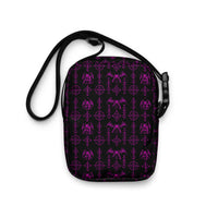 The Sixth Circle Pink utility crossbody bag featuring infernal demon horror artwork from the Demonology collection.